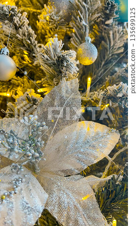 Festive golden Christmas tree decorations with glitter 135699125