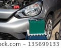 Image of replacing a car battery 135699133