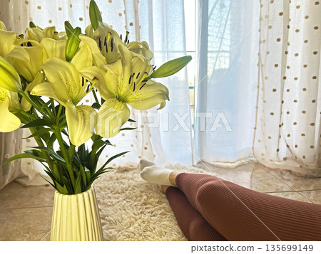 Yellow Lilies in Vase by Window 135699149