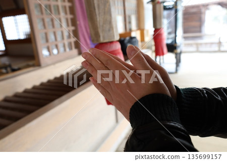 Visiting a shrine Visiting a shrine 135699157