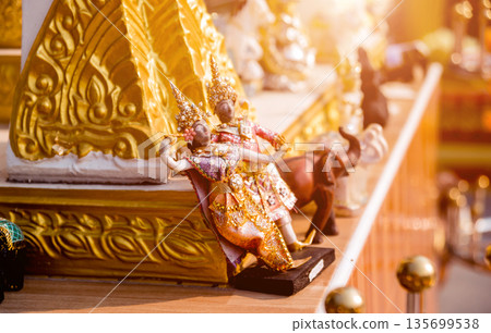 Symbols of Buddhism. South-Eastern Asia. Details of buddhist temple in Thailand. Symbols of Buddhism. South-Eastern Asia. Details of buddhist temple in Thailand. 135699538
