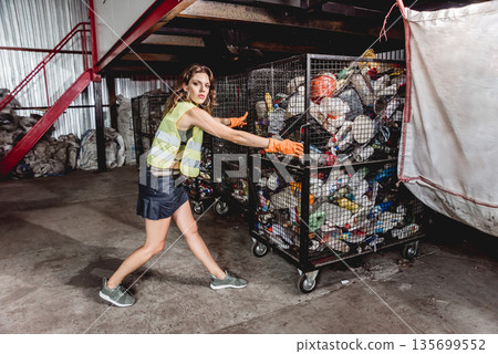 At modern recycling plant. Separate garbage collection. Recycling and storage 135699552
