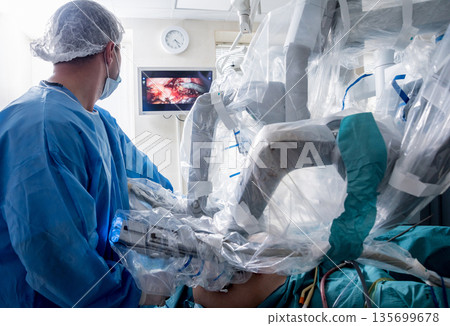 Modern surgical system. Medical robot. Minimally invasive robotic surgery. Modern surgical system. Medical robot. Minimally invasive robotic surgery. 135699678