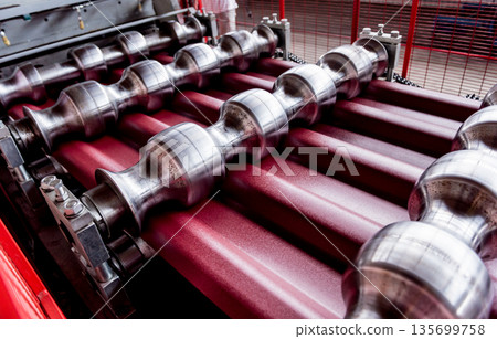 Metal sheet forming machine at the modern metalwork factory. Metal sheet forming machine at the modern metalwork factory. 135699758