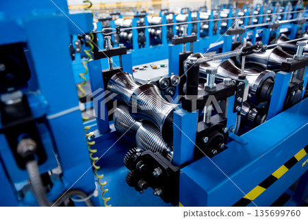 Metal sheet forming machine at the modern metalwork factory. Metal sheet forming machine at the modern metalwork factory. 135699760