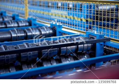 Metal sheet forming machine at the modern metalwork factory. Metal sheet forming machine at the modern metalwork factory. 135699768