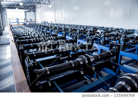 Metal sheet forming machine at the modern metalwork factory. Metal sheet forming machine at the modern metalwork factory. 135699769