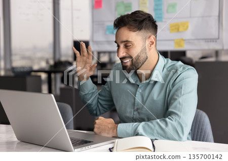 Positive professional businessman starts online meeting event by business Positive professional businessman starts online meeting event by business 135700142