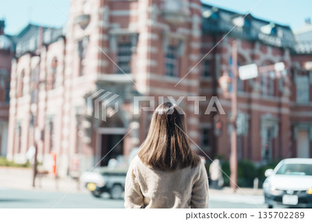 Woman tourist sightseeing at Bank of Iwate Red Brick Building, happy traveler travel in Morioka city, Iwate prefecture, Japan. famous Landmark Travel and Vacation destination Woman tourist sightseeing at Bank of Iwate Red Brick Building, happy traveler travel in Morioka city, Iwate prefecture, Japan. famous Landmark Travel and Vacation destination 135702289