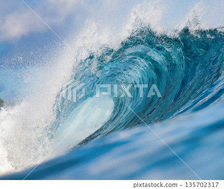 Vast Ocean Wave Crashing Fiercely, Powerful Surf Surging Beneath Bright Sky 135702317