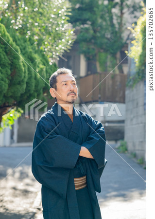 A man wearing a kimono 135702665