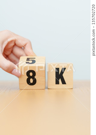 hand change wooden block from 5K to 8K, display resolution, Ultra High Definition, UHD, pixels, Technology, network, TV streaming, Social media and digital concepts hand change wooden block from 5K to 8K, display resolution, Ultra High Definition, UHD, pixels, Technology, network, TV streaming, Social media and digital concepts 135702720