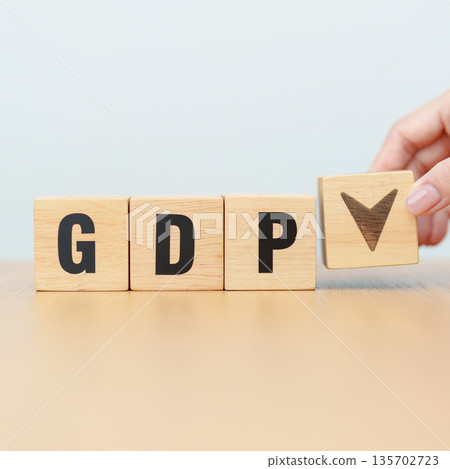 wooden block of GDP text to UP and Down arrow symbol icon. Gross domestic product, Financial, Management, Economic growth, consumption, investment, government purchases and net exports 135702723