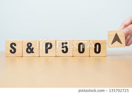 Hand change wooden block of SP500 text to UP and Down arrow symbol icon. stock market index, trade, trade company in the United States, financial growth and Cut loss concept 135702725