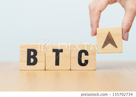 Hand change Wooden block with BTC or Bitcoin text to UP and Down arrow symbol. cryptocurrency, blockchain, price, down and up, decrease and increase, cut loss, trade and financial concepts Hand change Wooden block with BTC or Bitcoin text to UP and Down arrow symbol. cryptocurrency, blockchain, price, down and up, decrease and increase, cut loss, trade and financial concepts 135702734