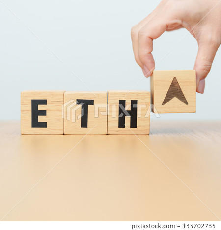 Hand change Wooden block with ETH or Ethereum text to UP and Down arrow symbol. cryptocurrency, blockchain, price, down and up, decrease and increase, cut loss, trade and financial concepts Hand change Wooden block with ETH or Ethereum text to UP and Down arrow symbol. cryptocurrency, blockchain, price, down and up, decrease and increase, cut loss, trade and financial concepts 135702735