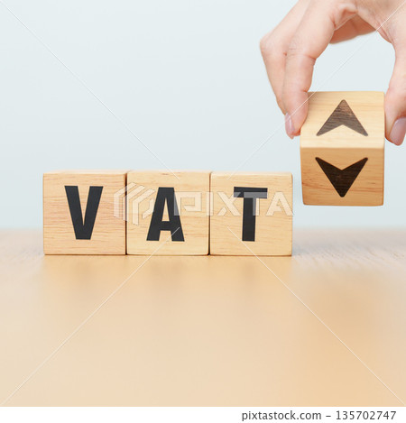 hand change wooden block with VAT text to UP and Down arrow icon. Value Added Tax, decrease and Increase, Taxpayer, Taxable Income, Tax Filing, Deduction, Withholding Tax, Computation and Exemption hand change wooden block with VAT text to UP and Down arrow icon. Value Added Tax, decrease and Increase, Taxpayer, Taxable Income, Tax Filing, Deduction, Withholding Tax, Computation and Exemption 135702747