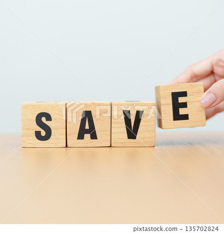 hand change wooden block Save to Safe. money savings, risk management, investment, financial security and business concept hand change wooden block Save to Safe. money savings, risk management, investment, financial security and business concept 135702824