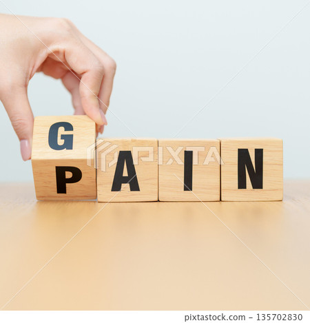 hand change wooden block Pain to Gain. solution and Value, Mindset for growth business, No Pain No Gain, Work hard, Motivation, Fitness, health, wellness and challenge concepts hand change wooden block Pain to Gain. solution and Value, Mindset for growth business, No Pain No Gain, Work hard, Motivation, Fitness, health, wellness and challenge concepts 135702830