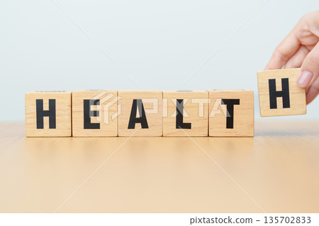 wooden block Health. Investment, Healthcare, Insurance, wellness, wellbeing and Work Life Balance concept 135702833