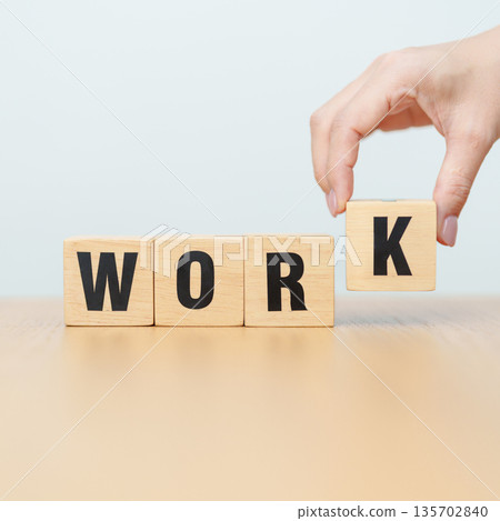 hand change wooden block Work to Worth. Know your worth concept 135702840