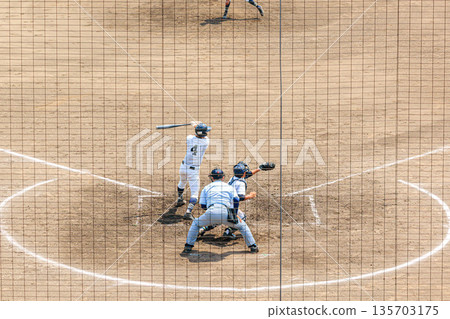 High school baseball behind the backstop 135703175