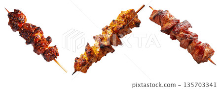Anticuchos grilled beef meat skewer isolated on white transparent background, concept of South American barbecue cuisine 135703341