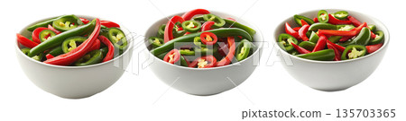 Bowl of sliced red and green chili peppers, isolated on a white transparent background. Bowl of sliced red and green chili peppers, isolated on a white transparent background. 135703365