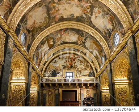 Gorgeous ceiling paintings and gold decorations of St. John's Cathedral, Valletta, Malta Gorgeous ceiling paintings and gold decorations of St. John's Cathedral, Valletta, Malta 135704674