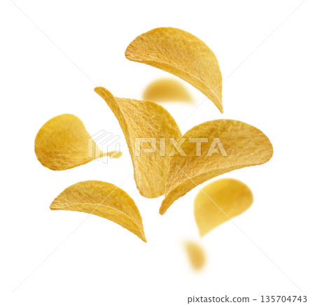Potato chips levitate on a white background 135704743