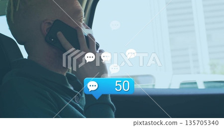 Man in green sweater talking on smartphone in car, with 50 chat bubbles, headrest, copy space Man in green sweater talking on smartphone in car, with 50 chat bubbles, headrest, copy space 135705340