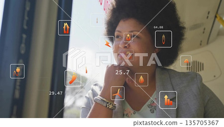 Gazing woman in blazer and blouse on commuter train by window viewing numeric readouts, copy space Gazing woman in blazer and blouse on commuter train by window viewing numeric readouts, copy space 135705367