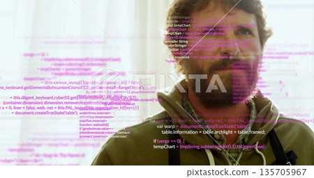 Standing bearded male wearing hoodie and harness before sheer curtain, showing magenta code overlay 135705967