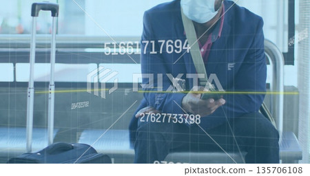 Checking smartphone man wearing suit and mask sitting at airport with suitcase and bag amid overlay Checking smartphone man wearing suit and mask sitting at airport with suitcase and bag amid overlay 135706108