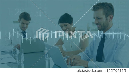 Analyzing data team wearing formal attire sitting at meeting table, with laptops and water glasses Analyzing data team wearing formal attire sitting at meeting table, with laptops and water glasses 135706115