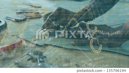 Manipulating tech hands tightening circuit board with screwdriver at lab bench, wires and charts 135706194