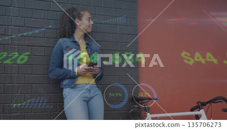Woman denim-clad using smartphone leaning by white bike at urban corner, data overlay, copy space Woman denim-clad using smartphone leaning by white bike at urban corner, data overlay, copy space 135706273