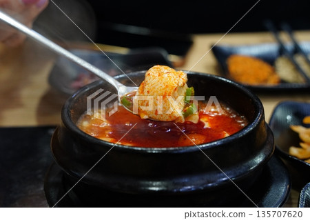 Spoonful of Spicy Korean Soft Tofu Stew (Sundubu Jjigae) 135707620