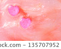 Two connected hearts 135707952