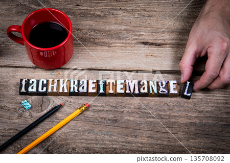 Skilled Labor Shortage Word In German Fachkraeftemangel Wooden Letter Blocks 135708092
