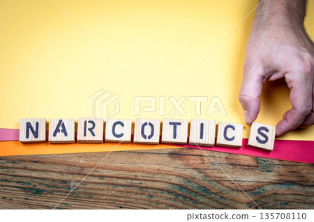NARCOTICS Illegal Trade And Drug Crime Concept Using Wooden Letter Blocks NARCOTICS Illegal Trade And Drug Crime Concept Using Wooden Letter Blocks 135708110