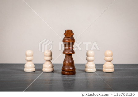 Leadership And Power Concept With Central Chess King And Pawns Leadership And Power Concept With Central Chess King And Pawns 135708120
