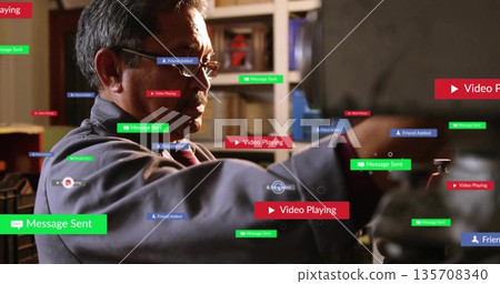 Adjusting senior Hispanic technician operating lathe at maker space, with AR overlays, copy space Adjusting senior Hispanic technician operating lathe at maker space, with AR overlays, copy space 135708340