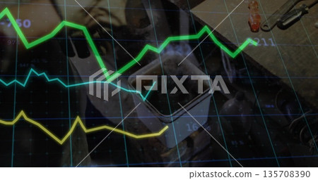 Showing metal container on workbench, with carabiner clip, plier-style clamp and line graph overlay 135708390
