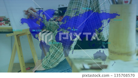 Woman marking plank beside easel at workshop bench, wearing plaid shirt with pencil and map overlay Woman marking plank beside easel at workshop bench, wearing plaid shirt with pencil and map overlay 135708570