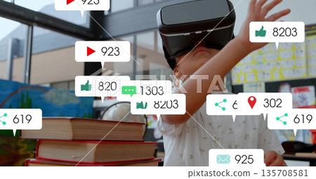 Exploring boy wearing VR headset engaging social media icons in modern classroom, copy space Exploring boy wearing VR headset engaging social media icons in modern classroom, copy space 135708581