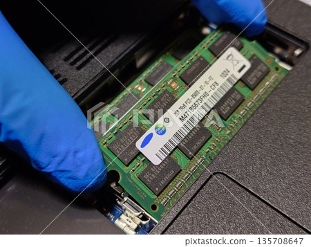 Installing main memory (RAM) in a laptop (PC) 135708647