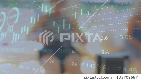Male analyst silhouette studying financial data at office desk, with candlestick chart overlays 135708667