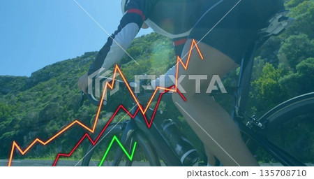 Pedaling cyclist in helmet powering up mountain road on drop bars, with bottles and graph overlays Pedaling cyclist in helmet powering up mountain road on drop bars, with bottles and graph overlays 135708710