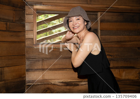 A woman relaxing in a sauna in Yatsugatake, Yamanashi 135709406